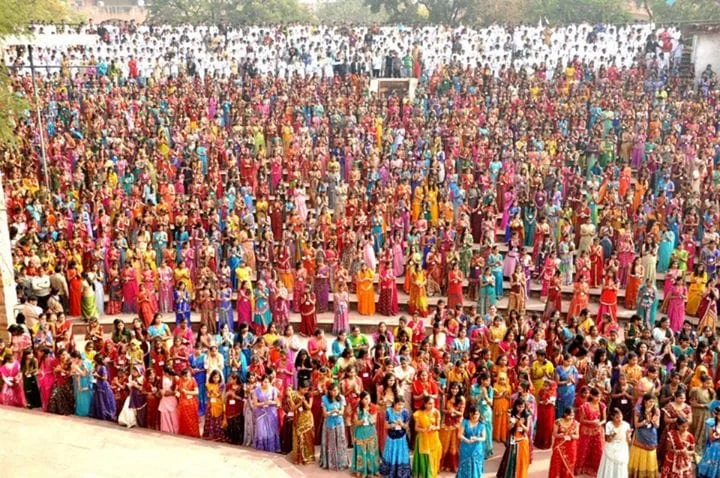 Thousands of participants in formation across a ground